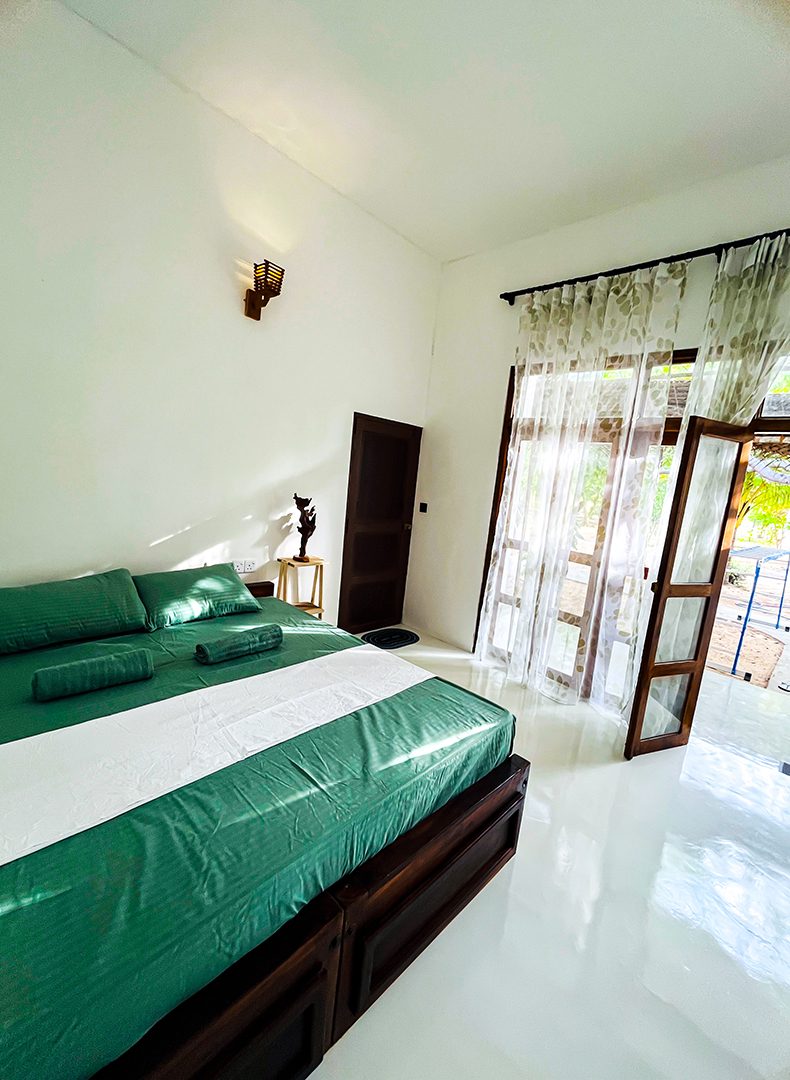 AC room with private kitchen at Footmark Surf Stay